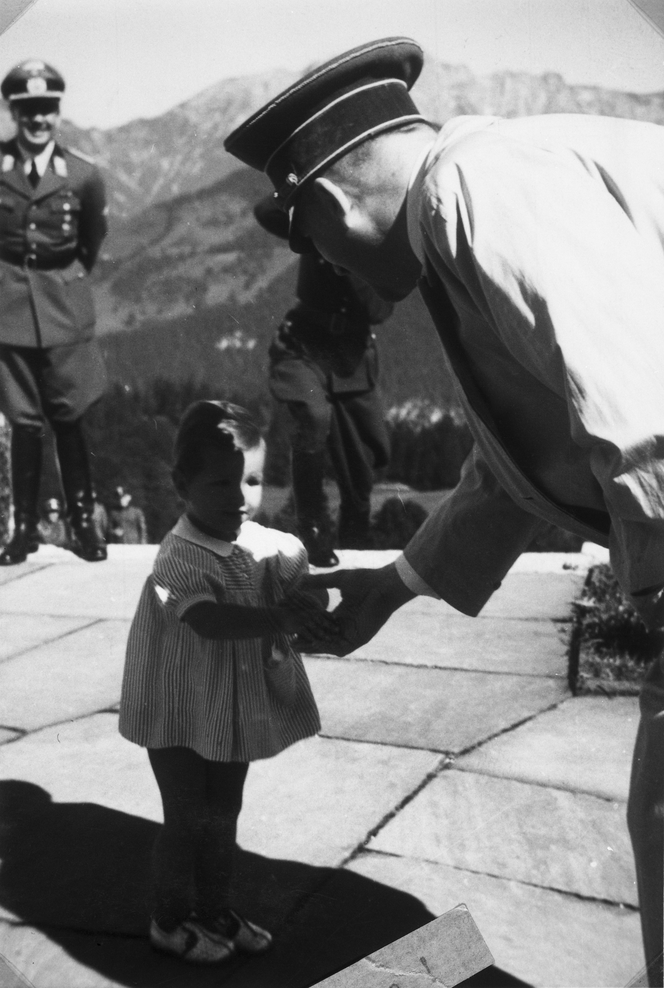 Adolf Hitler bids farewell to Uschi Schneider before his departure to Berlin, from Eva Braun's albums